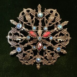 Elegant Vintage Brooch with Red and Blue Accents